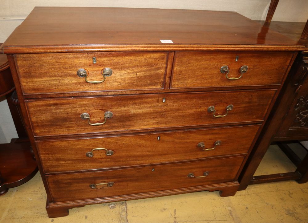 A George III mahogany chest, fitted two short and three long graduated drawers, on bracket feet, W.110cm, D.53cm, H.96cm